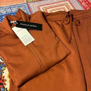 Women’s Pant outfit. Half-Zip Pullover Sweater – Rust Orange and matching pants.